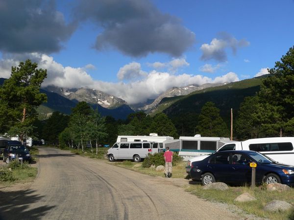 Amos returning to our camper/van (grey) in RMNP